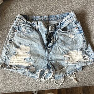American Eagle Outfitters Light Blue Distressed mom Short. Stain on the back